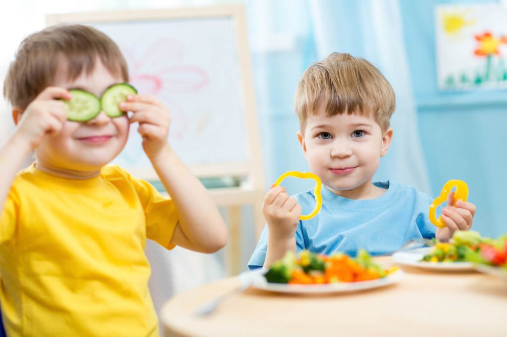 children eating food recommended by the best dentist in Davie FL